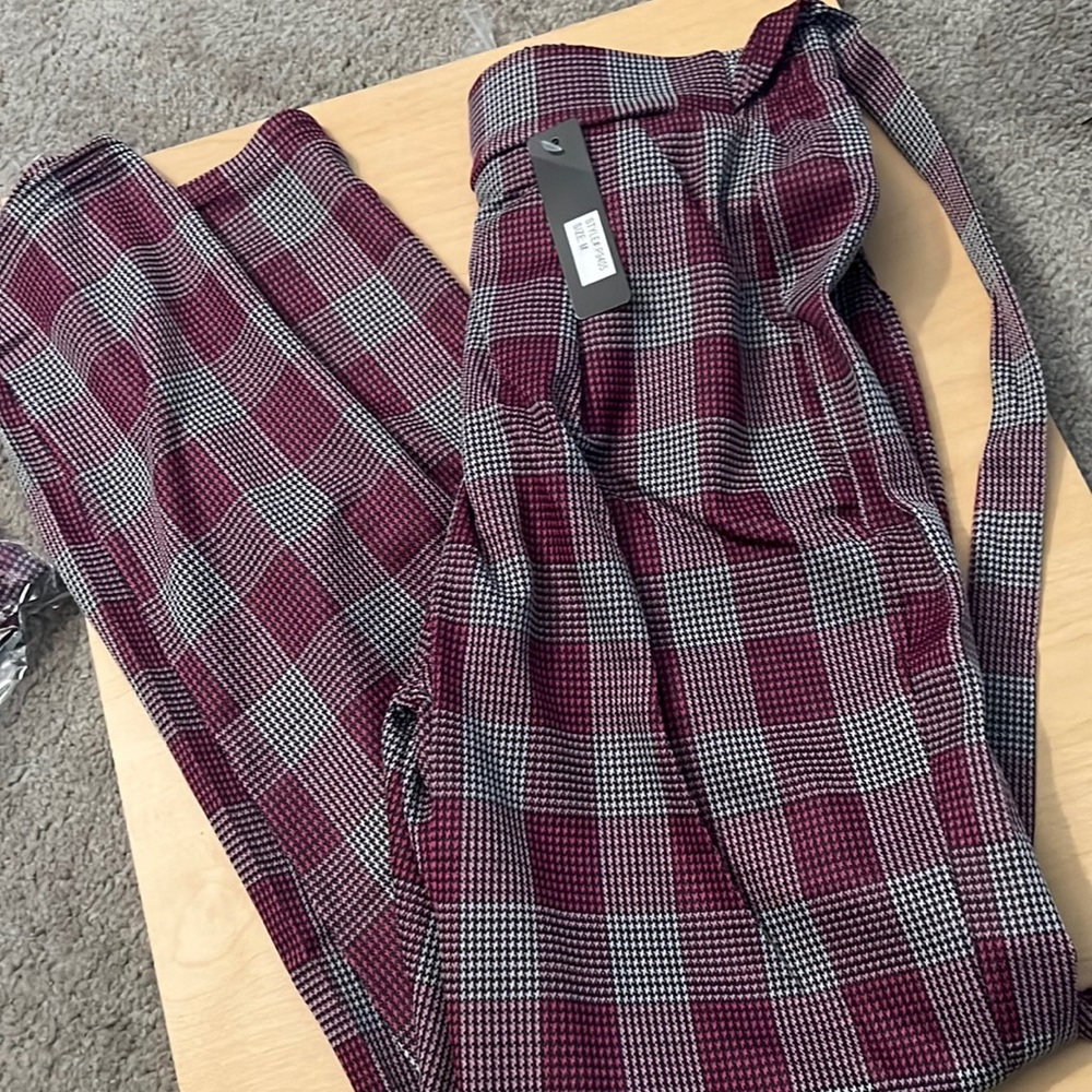 Brand New tapered legged plaid trousers.